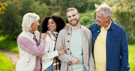 Canvas Print - Laughing, face and parents with children in nature for bonding, family love and care. Interracial, happy and portrait of senior people with a man and woman and a hug in a park or backyard together