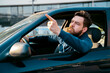 © phoenix021 - Angry man in the car threatening  somebody from the car
