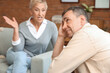 © Pixel-Shot - Mature man with his quarreling wife at home, closeup