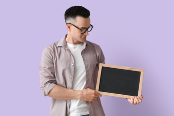 Sticker - Male teacher with chalkboard on lilac background