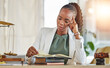 © JessicaLeigh J/peopleimages.com - Stress, reading and woman lawyer with analysis on case with reading in a office. Business proposal, professional and law firm with a African female worker with attorney books and research for report