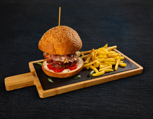 Wall Mural - Tasty burger with French fries