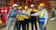 © Nassorn - Group of diverse workers standing together in storehouse holding hands. Multicultural team working in logistic distribution warehouse Latino, Caucasian and Asian people in manufacturing industrial.
