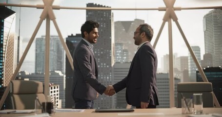 Aufkleber - Two Indian Business Partners Meet in Office, Shake Hands. Corporate CEO and Finance Manager Having a Meeting in City Office. Businesspeople Came to Discuss Real Estate Purchase and Marketing Projects