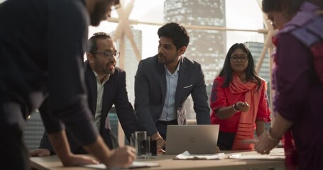Aufkleber - Finance Department Having a Meeting to Discuss a Project with Board Members. South Asian Colleague Using Laptop Computer, Working in Modern Office, Employees Having a Conversation in a Conference Room