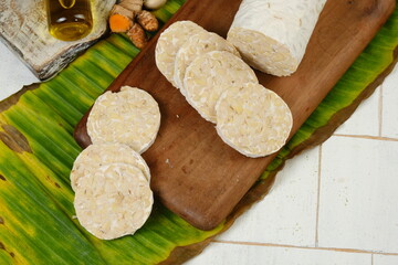 tempeh tempe Indonesian traditional food made from fermented soybeans. They are usually wrapped in banana leaves.