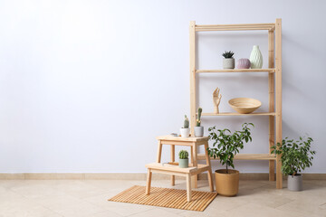 A shelf with flowers, a rack in the interior