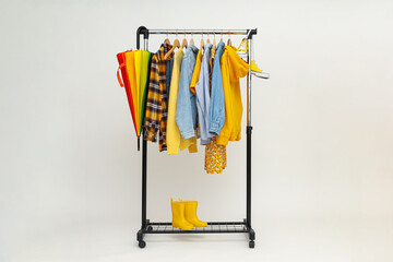 Wall Mural - Wardrobe rack with different clothes, concept of different clothes