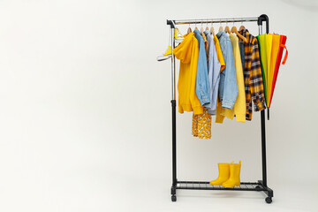 Wall Mural - Wardrobe rack with different clothes, concept of different clothes