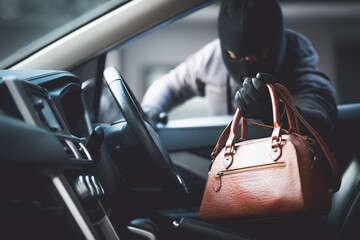 Thieves are stealing wallets in the car.