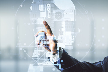 Wall Mural - double exposure of man hand working with creative human head microcircuit hologram on blurred office