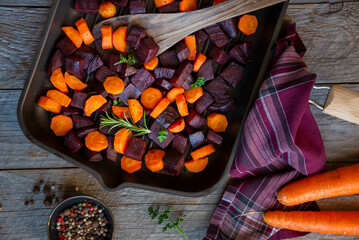 Wall Mural - Beets and carrots, cooked vegetables, healthy vegan food