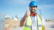 © Krakenimages.com - African american man builder smiling confident doing thumb up gesture at street
