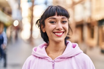 Sticker - Young woman smiling confident standing at street