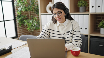 Poster - Young beautiful hispanic woman business worker having video call at office