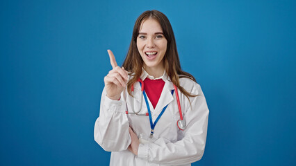 Poster - Young hispanic woman doctor standing with doubt expression having idea over isolated blue background