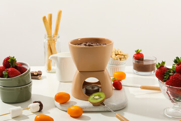 Wall Mural - Concept of tasty sweet food - chocolate fondue