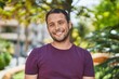 © Krakenimages.com - Young man smiling confident standing at park