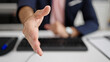 © Krakenimages.com - Young hispanic man business worker shake hand at office