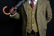 © jeremyimagery.com - Portrait of Vintage British Gentleman in Tweed Suit Holding Umbrella Over Shoulder.
