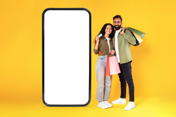 Wall Mural - Arabic Couple With Bags And Credit Card Near Smartphone, Collage