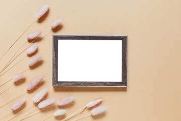 Sticker - Empty card mockup photo frames, minimalist floral decor made of dried spikelets on a pastel background, Template for congratulations or invitations.