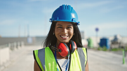 Wall Mural - African american woman builder smiling confident standing at street