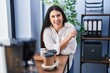© Krakenimages.com - Young hispanic woman business worker smiling confident standing at office