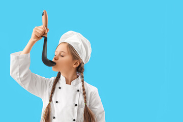 Sticker - Little chef with ladle on blue background