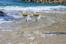 Summer Time In Provence, Two Glasses Of Cold Champagne Cremant Sparkling Wine On Sandy Beach Near Saint-Tropez In Sunny Day, Var Department, France