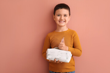 Poster - Cute little boy with pencil case on color background