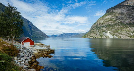 Wall Mural - Beautiful Nature Norway natural landscape with red fishing houses.