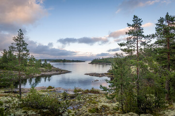 Poster - Ladoga lake bay and small islands at sunset warm light. Nature of Karelia republic, Russia.