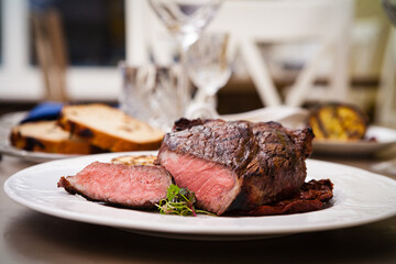 Wall Mural - Entrecote with grilled garlic served on a plate