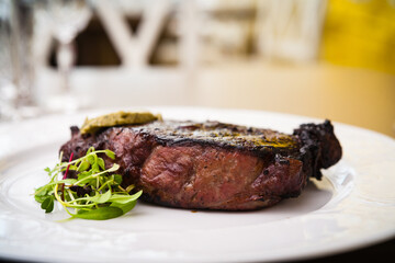 Wall Mural - New York steak with herb butter on a plate