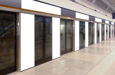 Wall Mural - Perspective view of mockup of multiple blank banners, posters, in generic train station; advertising space templates; OOH mock up. Straight front view of MRT platform, without people