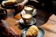© Wavebreak Media - Hands of african american couple sitting at table in a cafe