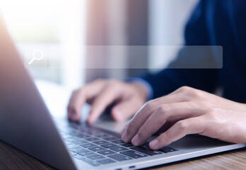 Wall Mural - businessman showing internet search in laptop