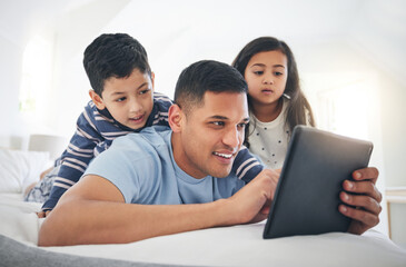 Wall Mural - Father, children and tablet, games or cartoon streaming online with internet, bonding and people relax together in bedroom. Watch animation film, man and kids at home with connection and subscription