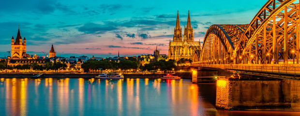 Wall Mural - Cologne Koln Germany during sunset, Cologne bridge with the cathedral. beautiful sunset at the Rhine river