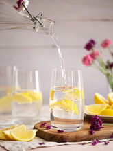 Water With Lemon Slices, Bottle Pouring