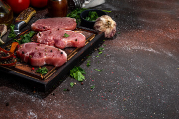 Sticker - Raw pork meat steaks cooking background