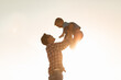 © kieferpix - Father son playing together bonding at sunset