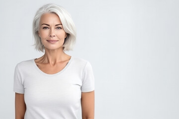 Beautiful Mature Woman with White Hair Smiling at Camera on white background with copy space. Generative AI