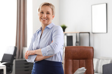 Wall Mural - Portrait of stylish mature businesswoman  in office