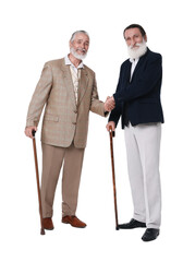 Wall Mural - Senior men with walking canes shaking their hands on white background