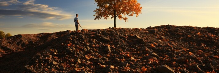 Canvas Print - A man standing on top of a pile of dirt. Generative AI image.