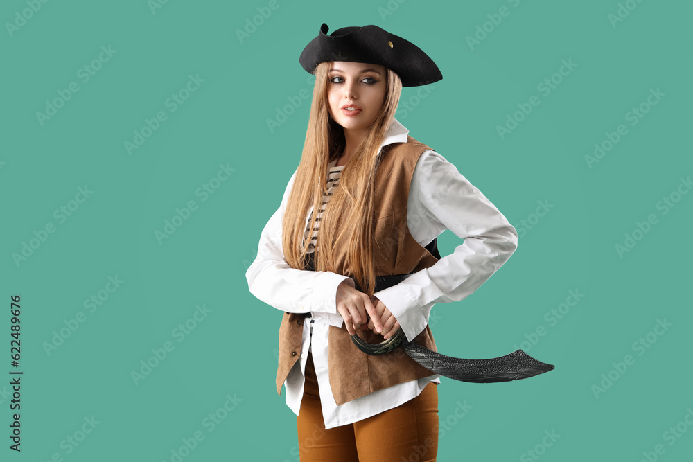 Beautiful female pirate with sword on green background