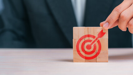 Poster - Leadership Success Strategy, Unlocking Business Goals with Sustainable Growth and Innovative Solutions with signs on Wooden Cube.
