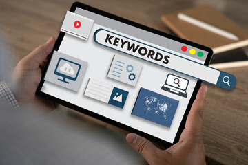 keywords on a website for content businessman Search keywords on a laptop, browse in the office, optimize SEO engine communication on the computer, find data analysis, and advertise on the internet.